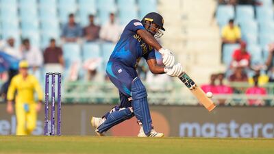 Sri Lanka's Kusal Perera hits a boundary. AP