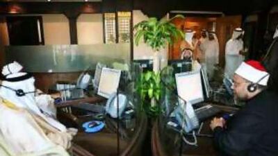 Workers take calls at the centre.