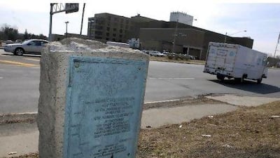 One of the plaques marking the Knox Trail stands along Northern Boulevard in Albany, the capital of New York state. It is one of 56 markers placed along the trail. Tim Roske / AP Photo