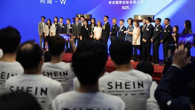 Shein executives and staff attend the company's listing ceremony at the Hong Kong Exchange. EPA