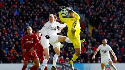 Liverpool's Alisson in action. Reuters