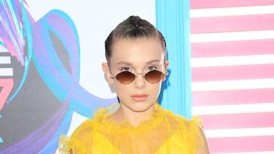 Millie Bobby Brown, wearing yellow Kenzo, arrives for the Teen Choice Awards in Los Angeles on August 13, 2017. EPA