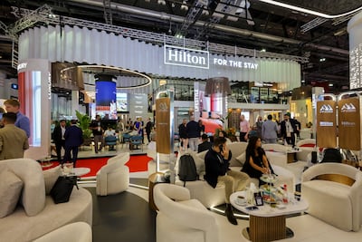 The Hilton stand at the Arabian Travel Market. The hotel group does not expect AI to fundamentally change the people-focused nature of hospitality. Victor Besa / The National