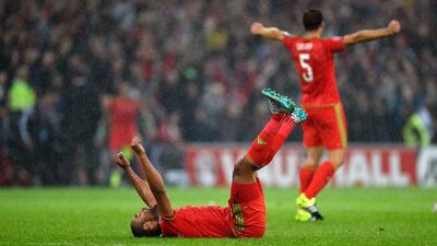 Wales captain Ashley Williams celebrates on the final whistle after a 1-0 Euro 2016 qualifying win over Belgium on Friday night. Stu Forster / Getty Images
