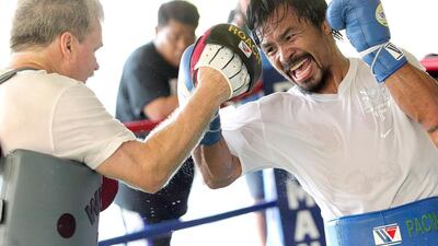 Manny Pacquiao trains with Freddi Roach in General Santos, Philippines, in 2014 at the Pacman Wild Card Gym. Mike Young for The National