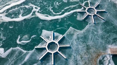 The waters of Lake Michigan are frozen in Montrose Harbour, in the Great Lakes region, in Chicago. AP