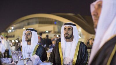 Sheikh Zayed bin Hamdan, left, and Sheikh Shakboot bin Nahyan, right, attend the UAE Armed Forces 38th Unification ceremony. Ryan Carter / Crown Prince Court - Abu Dhabi