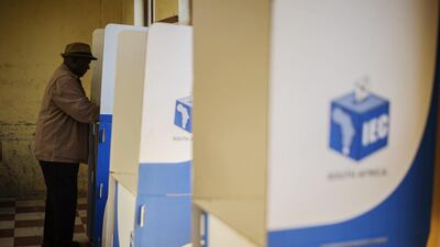A South African man prepares his ballot before vote as part of the general elections, on May 7, 2014 at the Qunu Junior Secondary school in Qunu, South Africa. Some 22,000 voting stations were operating at schools, places of worship, tribal authority sites and hospitals, and several dozen vehicles serving as mobile voting stations were heading to remote areas to meet people. Gianluigi Guercia / AFP