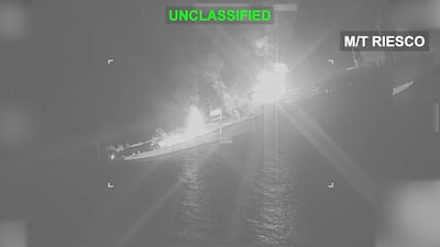 An Iranian crude oil carrier identified as Riesco burns as it sinks after being struck by US forces. Photo: US Central Command via Reuters.