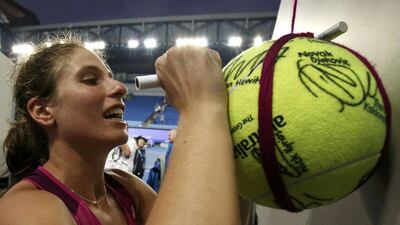 Britain's Johanna Konta signs autographs after winning her fourth round match against Russia's Ekaterina Makarova at the Australian Open tennis tournament at Melbourne Park, Australia, January 25, 2016. Issei Kato / Reuters