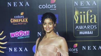 You've got to love a dress that encourages a twirl: Alia Bhatt's IIFA Awards dress this year was a peach dream by Georges Chakra. It looked even more beautiful in real life than it does in these pictures. AFP