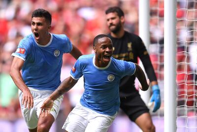 Raheem Sterling of Manchester City celebrates after scoring his team's first goal during their Community Shield match. Laurence Griffiths / Getty Images