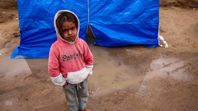 A girl at a camp for displaced Palestinians in Al Zaywayda in the central Gaza Strip. AFP