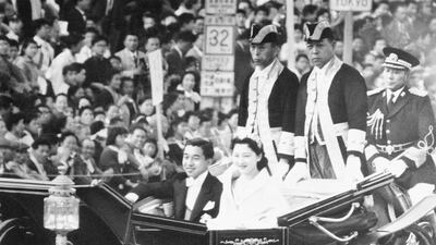 Japan's Prince Akihito and his bride, the former Michiko Shoda, acknowledge the cheers of Tokyo throngs as the royal carriage rolls through the city after their wedding, April 10, 1959. When he abdicates April 30, 2019, Akihito will become the first emperor in Japan’s modern history to see his era end without ever having a war. AP