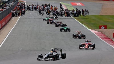 Formula One drivers leave the grid following Sundays's restart of the British Grand Prix. Valdrin Xhemaj / EPA / July 6, 2014