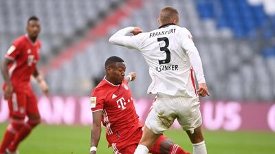 Bayern's David Alaba in action against Frankfurt's Stefan Ilsanker. EPA
