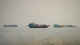 Ships stranded in the Strait of Hormuz, as seen from Musandam, Oman. Reuters