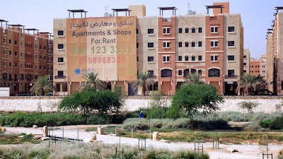 New apartments advertised for rental stand in the Al Qasr residential project, built by Dar Al-Arkan Real Estate Development Co., in Riyadh, Saudi Arabia, on Wednesday, Oct. 13, 2010. Builders in the Persian Gulf region, hit by slumping orders in their home countries, are eager to expand in Saudi Arabia when lending picks up. Photographer: Waseem Obaidi/Bloomberg