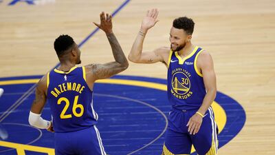 Stephen Curry, right, surpassed Wilt Chamberlain's tally of 17,783 points set between 1959 and 1965 during his 53-point performance against the Denver Nuggets. AFP