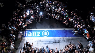 Taking a gamble, I climbed to the very top tier of the pit lane Grandstand and hoped to get something a little different of Sebastian Vettel and his Red Bull team celebrating the German driver’s title victory. As luck would have it the Circuit authorities switched off the pit lane lights at just the right time resulting in way more dramatic lighting than there would have otherwise been.