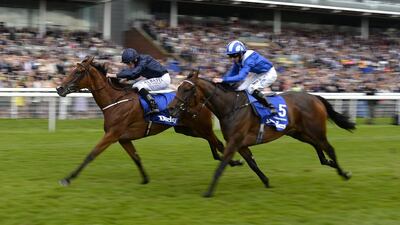 Ryan Moore riding Tapestry, left, win The Darley Yorkshire Oaks to end Taghrooda's unbeaten streak. Alan Crowhurst / Getty Images