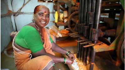 Sungha Bhain makes masala paste in her workshop in the Dharavi district of Mumbai. Pia Heikkila for The National
