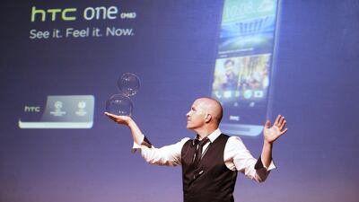 HTC launched its latest flagship phone, the HTC One (M8), on April 2 in Dubai. Above, an entertainer performs during the smartphone's launch. Sarah Dea / The National
