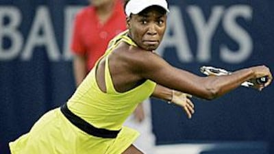 Venus Williams returns the ball to Anastasia Pavlyuchenkova last night in the quarter-final.