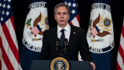Secretary of State Antony Blinken introduces President Joe Biden for remarks to State Department staff. AP Photo
