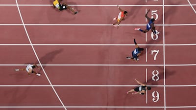 USA's Grant Holloway crosses the finish line to win the men's 110m hurdles final at the Athletics World Championships in Doha on Wednesday, October 2. AFP