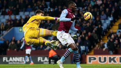 Costel Pantilimon of Sunderland challenges Christian Benteke of Aston Villa. Ben Hoskins / Getty Images