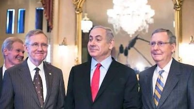 Benjamin Netanyahu, the Israeli prime minister, meets members of the US Senate Leadership in Washington yesterday. His talks with the US President Barack Obama focused on Iran's nuclear programme, rather than Israeli-Palestinian peace. With Mr Obama eager to secure support from the pro-Israel bloc ahead of the elections, Palestinians have criticised his foreign policy.