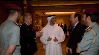 Sheikh Saif bin Zayed, the UAE Interior Minister, centre, chats with World Security Forum delegates yesterday.