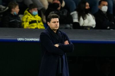 PSG manager Mauricio Pochettino watches from the sidelines as his side crash out of the Champions League against Real Madrid. AP