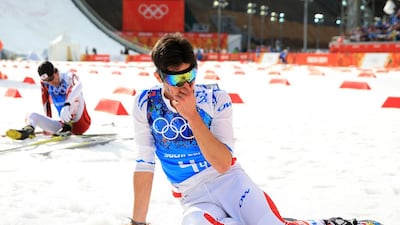 Jason Lamy-Chappuis of France collapses at the finish line in the Nordic Combined Men's Team 4x5km at RusSki Gorki Jumping Center on February 20, 2014 in Sochi, Russia. Richard Heathcote / Getty Images