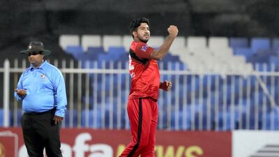 Sharjah's Junaid Siddique takes the wicket of Fujairah's Waseem Muhammad during the final of the Emirates D10 at Sharjah Cricket Stadium. All photos by Chris Whiteoak / The National