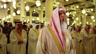 Saudi Arabia's Grand Mufti Abdulaziz Al Sheikh prays at the Imam Turki bin Abdullah mosque in Riyadh during Eid Al Fitr morning prayers on September 9, 2010. Hassan Ammar, File/AP Photo