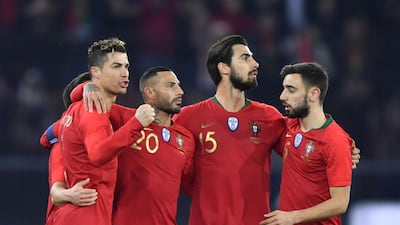 Cristiano Ronaldo, left, and Ricardo Quaresma, second left, combined once again to guide Portugal to victory over Egypt. Fabrice Coffrini / AFP