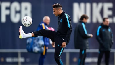 Neymar juggles the ball during a Barcelona training session. David Ramos / Getty Images