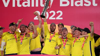 BIRMINGHAM, ENGLAND - JULY 16: Hampshire captain James Vince lifts the Vitality Blast trophy with teammates afterthe Vitality Blast Final match between Lancashire Lightning and Hampshire Hawks at Edgbaston on July 16, 2022 in Birmingham, England. (Photo by Alex Davidson / Getty Images)