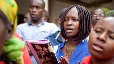 Christian faithfuls pray near the Holy Family Basilica in Nairobi, Kenya on Good Friday during the Holy Week of Easter. AP Photo