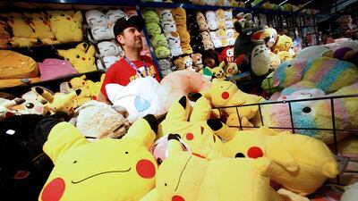Plush toys representing games characters on sale at the fair. Ralph Orlowski / Reuters