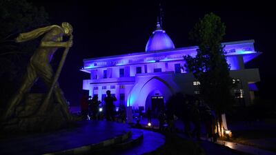 Gandhi Mandap museum is seen lit in blue on the occasion of the World Children’s Day in Guwahati as part of a campaign for children's rights during the Covid-19 pandemic, India. AFP