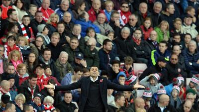 Sunderland manager Gus Poyet reacts during his side's draw with Everton on Sunday in the Premier League. Nigel Roddis / Getty Images