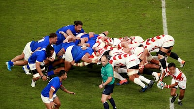 Yutaka Nagare of Japan offloads the ball in Toyota City. Getty