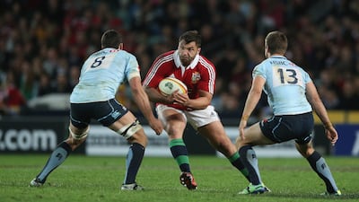 Alex Corbisiero, centre, takes on Dennis, left, and Rob Horne. David Rogers / Getty Images