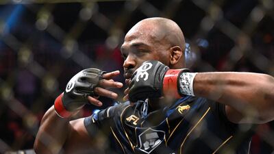 US mixed martial arts fighter Jon Jones celebrates after defeating French mixed martial arts fighter Ciryl Gane during their UFC 285 heavyweight title bout at T-Mobile Arena, in Las Vegas, Nevada, on March 4, 2023. (Photo by Patrick T. Fallon / AFP)
