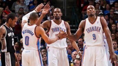 Kevin Durant, centre, and his Oklahoma City Thunder teammates went 21-9 against Eastern Conference teams for the 2012/13 season.