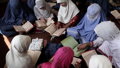 Afghan women and girls learn to read the Quran at a local madrassa, in Jalalabad, Afghanistan. Rahmat Gul / AP Photo