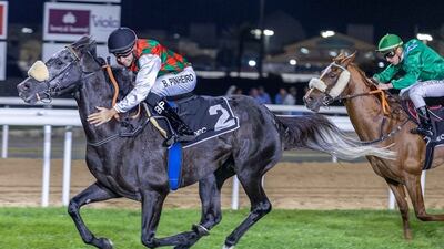 Bernardo Pinheiro pats Ajrad Athbah after crossing the finishing line in the Group 1 Emirates Championship at Abu Dhabi, on March 16, 2023. Photo: Adiyat Racing Plus